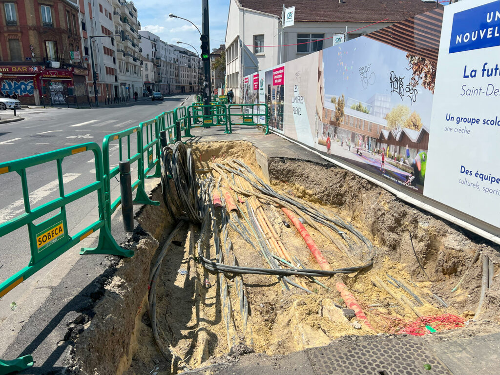 Construction signs and new wiring in open pit